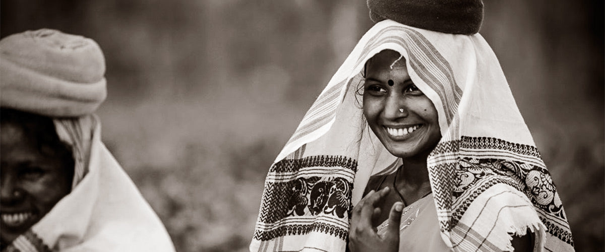 Women in the tea gardens with the gamossa